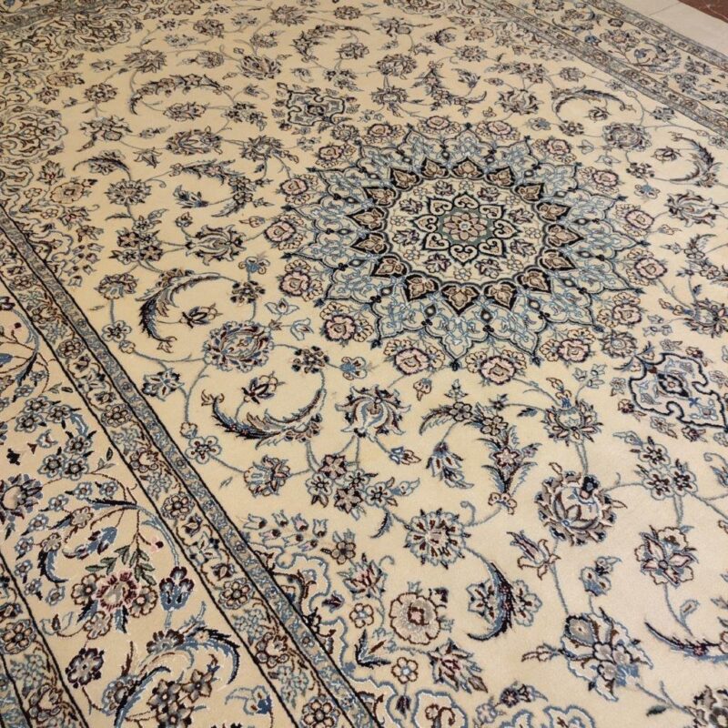 A pair of six-meter old hand-woven Nain design code 39 carpet