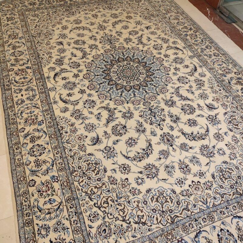 A pair of six-meter old hand-woven Nain design code 39 carpet